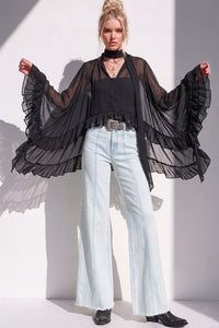 RUFFLED BLOUSE WITH MOCK NECK AND LONG ASYMMETRICAL SIDES W1566TIA