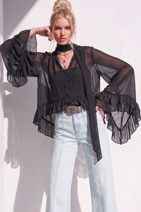 RUFFLED BLOUSE WITH MOCK NECK AND LONG ASYMMETRICAL SIDES W1566TIA