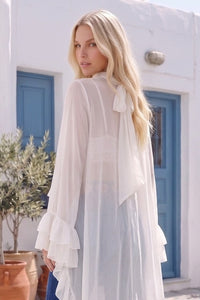 RUFFLED BLOUSE WITH MOCK NECK AND LONG ASYMMETRICAL SIDES W1566TIA